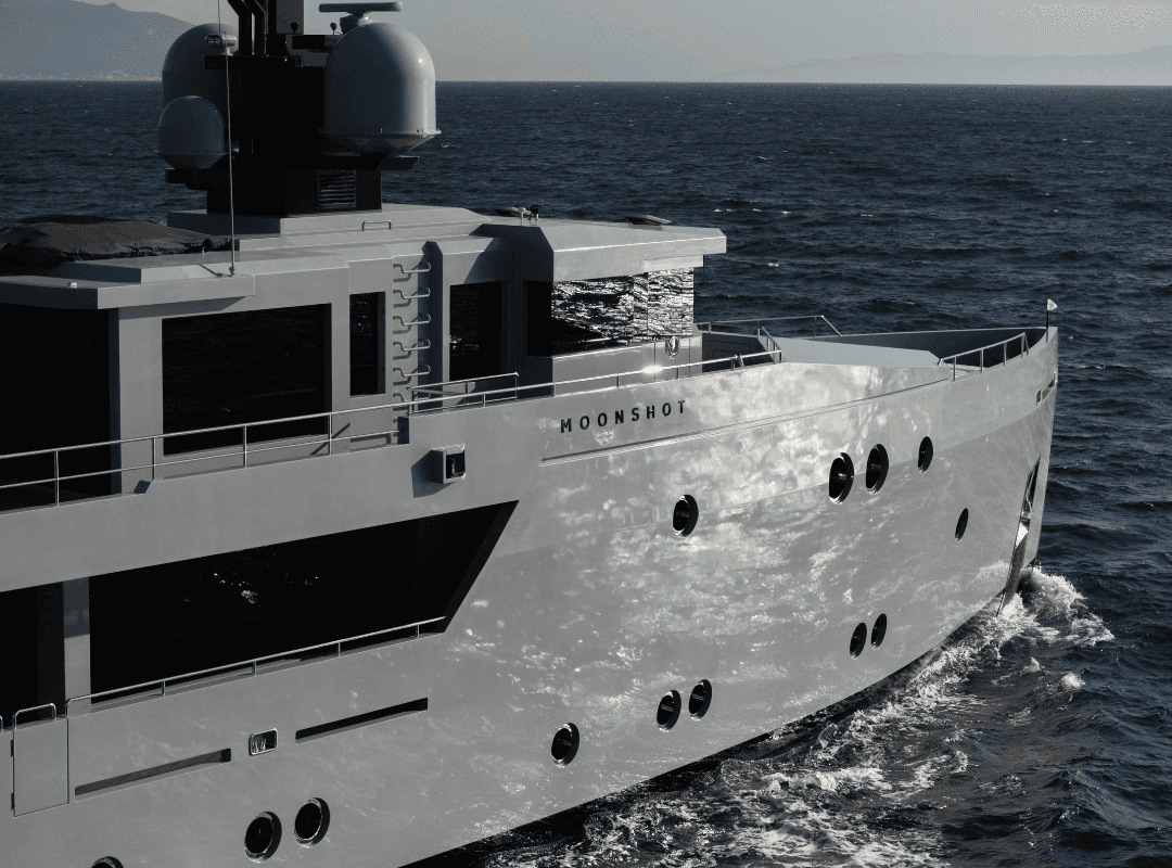 Sleek modern yacht "Moonshot" cruising through deep blue ocean with sun reflecting off its hull, set against a distant mountainous horizon.